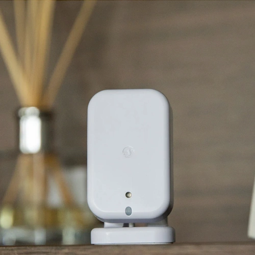 Shelly Presence Gen4 White mmWave presence sensor front view with stand